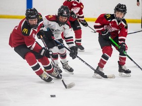 Minor hockey players square off in Saskatoon, SK on Friday, November 20, 2020.