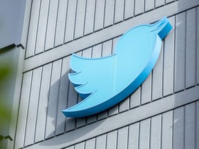 The Twitter logo is displayed outside the headquarters in San Francisco, California.
