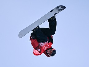 Canada's Mark McMorris competes in the snowboard men's slopestyle final run during the Beijing 2022 Winter Olympic Games at the Genting Snow Park H & S Stadium in Zhangjiakou on February 7, 2022. (Photo by Ben STANSALL / AFP)