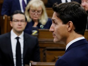 Prime Minister Justin Trudeau, watched by Conservative leader Pierre Poilievre, delivers remarks in the House of Commons. Too often, both government and opposition are mired in rhetoric without any practical policy follow-up.