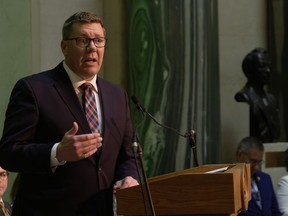 Premier Scott Moe speaks during the unveiling of the official portrait of former Premier Brad Wall at the legislature in Regina on Wednesday, Nov. 30, 2022. Scott Moe's target remained firmly on the federal government as he gathered with supporters for the first in-person Saskatoon Premier's Dinner in three years.
