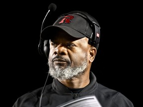 Ottawa Redblacks interim head coach Bob Dyce watches the team play against the Montreal Alouettes during first half CFL football action in Ottawa on Friday, Oct. 14, 2022. Dyce will return at the helm of the Redblacks next season after the CFL club officially named him as the third head coach in franchise history.THE CANADIAN PRESS/Justin Tang