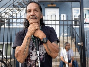 David Fineday stands for a photo in front of his home on 20th street on July 8. He was born on Sweetgrass First Nation but was taken as part of the Sixties Scoop — a mass removal of Indigenous children from their homes. Fineday has since worked to reconnect with his culture. He said the legacy of that discrimination continues to affect his community. “That’s why I live on 20th. This is my family now,” Fineday said. “I fell in a crack., but the crack became a ditch. Then it became a street.”