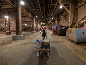 Nishell Selinger, a journey person Industrial Mechanic (Millwright), pulls a dolly of tools to the compaction plant where she’ll do screen maintenance at the Nutrien Vanscoy Potash Operation. Photo taken in Vanscoy, Sask. on Thursday, July 28, 2022.