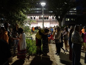 Community members came together for a candle lit vigil at Saskatoon City Hall on Sept. 6, in memory of the lives lost during the tragedy in James Smith Cree Nation.