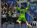 Saskatchewan Rush's Dan Lintner jumps up for joy after scoring the first goal of the game against Colorado Mammoth at SaskTel Centre in Saskatoon on Dec. 3, 2022.