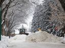Crews clear snow off of the roads in Varsity View in Saskatoon, SK on Tuesday, January 17, 2023.