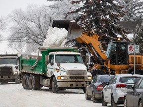 Crews clear snow off of the roads in Varsity View in Saskatoon, SK on Tuesday, January 17, 2023.