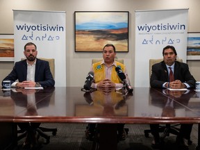 Chief Alvin Francis, centre, speaks at a press conference to announce a partnership between Nekaneet First Nation and Meckelbourg Financial Group on Mon., Jan. 23, 2023.