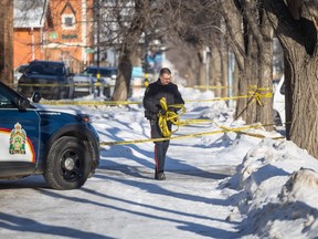 Police were on scene at a house on the 1200 block of Idylwyld Drive after responding to a report of a death. A 28-year-old man and a 44-year-old man were taken into custody after officers arrived. Photo taken in Saskatoon, SK on Monday, January 30, 2023.
