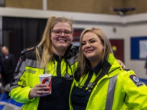 Primary Care Paramedic student Ashley Boa, right, and her friend and classmate Kamiryn Klassen attend an event announcing government funding for the Health Human Resources Action Plan at Saskatchewan Polytechnic.