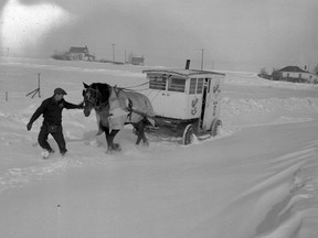 A photo of a milk wagon in deep snow, from Feb. 27, 1951. (City of Saskatoon Archives StarPhoenix Collection S-SP-B596-1)