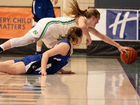 University of Saskatchewan Huskies' guard Gate Grassick takes on the University of Lethbridge Pronghorns during the Canada West conference semi final at the PAC. Photo taken in Saskatoon, Sask. on Friday, March 18, 2022.