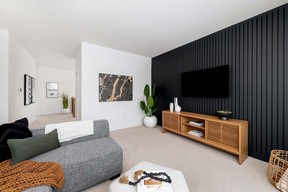 The second floor bonus room is an ideal family hangout space.