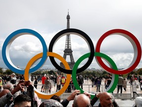 Olympic rings to celebrate the IOC official announcement that Paris won the 2024 Olympic bid are seen in front of the Eiffel Tower at the Trocadero square in Paris, France, Sept. 16, 2017.