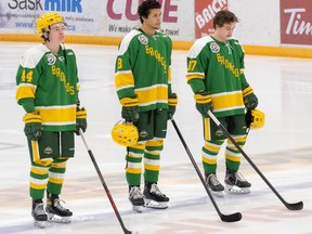 Humboldt Broncos team members stand for the national anthem during an SJHL game held at the Elgar Petersen Arena on Sunday Nov. 20, 2022. LIAM O'CONNOR /Saskatoon StarPhoenix