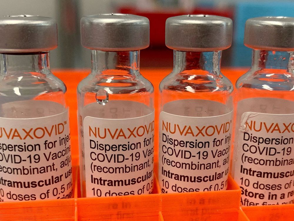 Four vials with the "Nuvaxovid" COVID-19 vaccine
