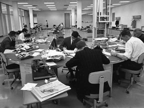 The u-shaped universal desk, used for editing and assigning, is shown in 1967, shortly after the new StarPhoenix newsroom opened.