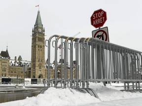 Fencing is seen on Parliament Hill in Ottawa, one year after the Freedom Convoy protests took place, on Friday, Jan. 27, 2023. The Parliamentary Protective Service expects 500 people to gather this weekend to mark a year since the "Freedom Convoy" occupied downtown Ottawa.
