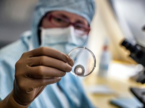 A surgeon performs a corneal transplant, on April 2, 2012 in Lyon, southeastern France.