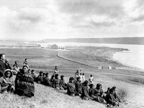 The Star Blanket Cree Nation, northeast of Regina, has announced the discovery of possible graves after a ground-penetrating radar search of the former site of the Qu'Appelle Indian Residential School. Aboriginal students, principal Father Joseph Hugonnard, and staff, including the Grey Nuns, of the industrial School are shown in Fort Qu'Appelle, Sask., in this May 1885 file photo.