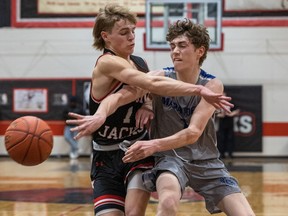 Walter Murray Marauders' Zach Hawley gets off a pass against Raymond Comets' defender Houston Ralph during the final of Saturday's Bedford Road Invitational Tournament (BRIT) on Jan. 14, 2023.