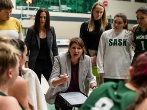 University of Saskatchewan Huskies head coach Lisa Thomaidis speaks to her team during Canada West Women's Basketball action against the University of Alberta Pandas in Saskatoon on Feb. 4, 2023.