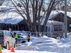 A city bus crashed into a Laval daycare Feb. 8, 2023. Ecole du Parc was the meeting point for parents and children. Dave Sidaway / Montreal Gazette
