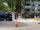 Police and firefighters attend the scene of a three-vehicle collision at the intersection of Main Street and Clarence Avenue in Saskatoon on June 8, 2022. (StarPhoenix: Phil Tank)