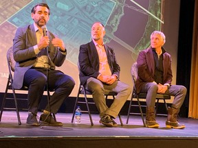 (left-to-right)  Stantec senior vice-president Simon O'Byrne, LMN Architects principal Brian Tennyson and HOK senior project manager Scott Ralston speak at a public event at the Roxy Theatre on Feb. 28, 2023.  Stantec and partners HOK and LMN are serving as technical advisers to the city on a proposed downtown arena district.