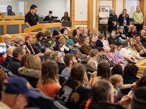 Alexander Edmunds speaks to city council during a meeting about a request to change the policy on change-room use at city facilities. The current policy allows people to use the change room corresponding to the gender they identify with.