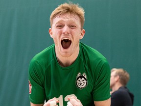 SASKATOON, SASK: Friday, March 10 - 0311 sports huskies vball - Huskies' Quinn Buchanan screams in excitement after his win against the Calgary Dinos Friday night for Canada West bronze at the PAC. The winner advances to nationals. Photo taken in Saskatoon, Sask. on Friday, March 10, 2023.