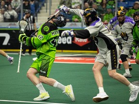 Saskatchewan Rush’s Mark Matthews gets held by a stick around his neck by the San Diego Seals during NLL action at SaskTel Centre. Photo taken in Saskatoon, Sask. on Saturday, March 11, 2023.