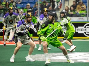 Saskatchewan Rush’s Matt Beers takes on a San Diego player.