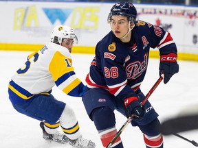 (FILE) Regina Pats forward Connor Bedard (98) looks for a pass during first period WHL action against the Saskatoon Blades in Saskatoon, SK on Friday, March 25, 2022.