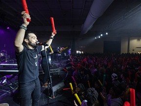 Julien Lepage leads 2,000 young Saskatchewan students in a drum performance with Circles of Rhythm, with his old Dingus band members Gaetan Lepage, Jordan Lindsay and Peter Couture to kick off Francofievre, a school festival that introduces students between the ages of 12 and 18 to Francophone music. Photo taken in Saskatoon, Sask. on Tuesday, March 28, 2023.