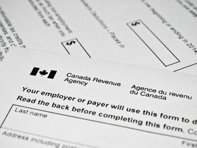 A personal income tax form used in Canada is shown.