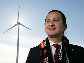 In this file photo from 2018, Cowessess First Nation Chief Cadmus Delorme near their wind turbine just east of Regina. The band has now inked a deal with with energy partner Innagreen for the Bekevar wind farm, near Kipling.