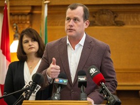 Highways and Infrastructure Critic Trent Wotherspoon, right, and Official Opposition Leader Carla Beck held a news conference at the Legislative Building on Thursday.