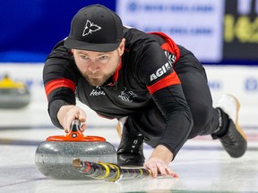 Mike McEwen throws a rock for Team Ontario at the 2023 Brier.