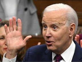 U.S. President Joe Biden gestures as he attends an address to the Canadian Parliament, in Ottawa, Canada, Mach 24, 2023.