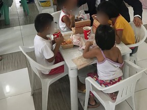 Cpl. Jared Clarke met some of the nine rescued children in an orphanage in the Philippines while testifying at their abuser's trial in 2018. The woman was arrested after Saskatchewan RCMP discovered she had been livestreaming the sexual abuse of children to a man named Philip Chicoine in Saskatoon.