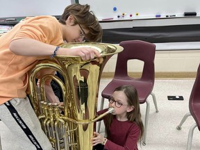 Students from Craik, Sask. and Oakbank, Man. bond over band instruments after a busload of Manitoba students were stranded in the Saskatchewan town.