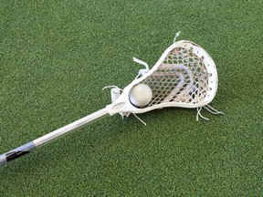 A lacrosse stick and ball