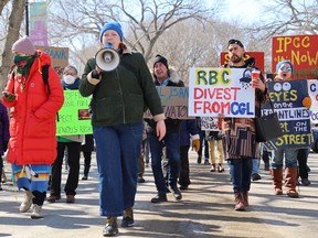 Protestors gather outside of the Royal Bank of Canada's annual general meeting at the Delta Bessborough in Saskatoon on April 5, 2023. (Rob O'Flanagan/Saskatoon StarPhoenix)