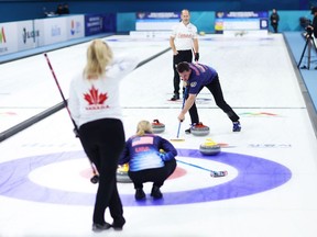 Canada's Jennifer Jones and Brent Laing play against Cory Thiesse and Korey Dropkin at the World Mixed Doubles Curling Championship in Gangneung, Korea on Friday, April 28, 2023. Canada will play for the bronze medal after falling 6-2 to the United States in the semifinal match.