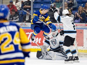 Saskatoon Blades' forward Justin Lies takes to the air during Tuesday's playoff loss to the Winnipeg Ice.