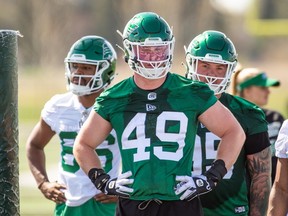 Defensive lineman Lake Korte-Moore gets ready for a drill during the first day of the Saskatchewan Roughriders training camp at Griffiths Stadium.