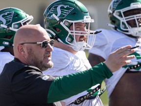 Offensive line coach Anthony Vitale hopes to point center Peter Godber and the new-look O-line unit in the right direction as the Saskatchewan Roughriders hold training camp in Saskatoon at Griffith's Stadium in PotashCorp Park. Photo taken in Saskatoon on Tuesday, May 16, 2023.