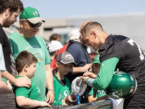 Trevor Harris signs autographs